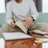 Adult reviewing inherited IRA documents and retirement account paperwork — 2025 inherited IRA changes planning.